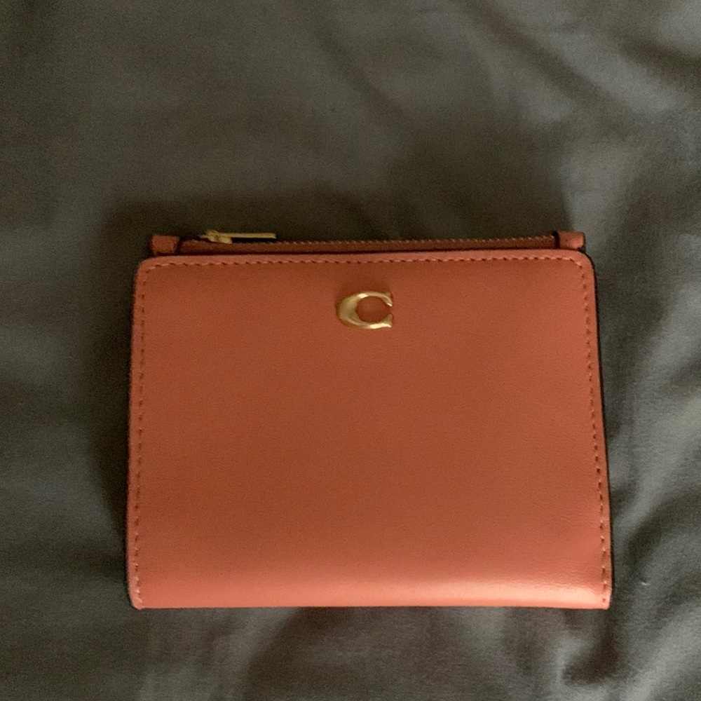 New Coach wallet. Soft leather. Zipper pocket. Card holders.